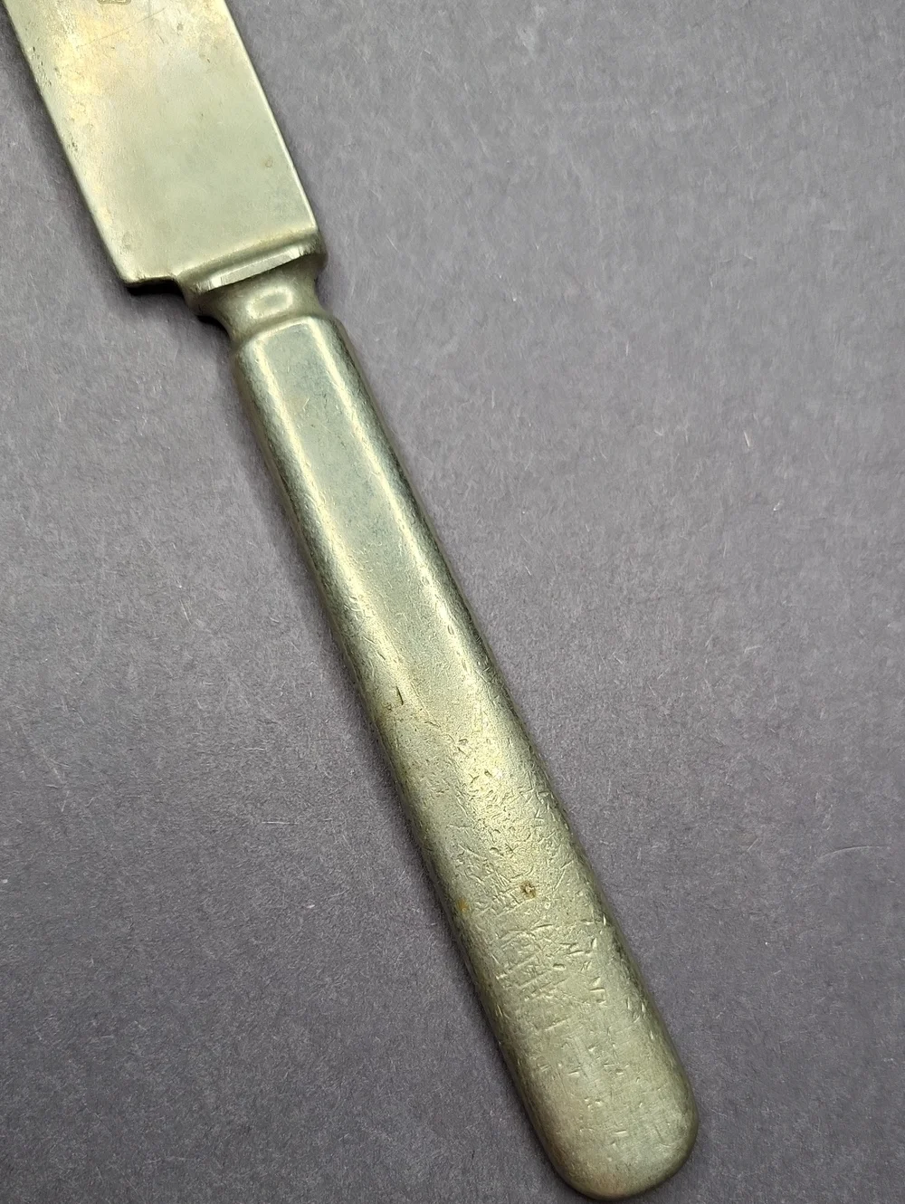Stainless Butter Knife with Embossed Maker's Mark - Silver Tone